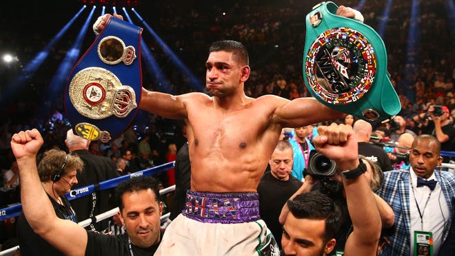 Amir Khan believes Floyd Mayweather is ducking a fight with him. (Mark J. Rebilas-USA TODAY Sports)