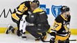 Pittsburgh Penguins center Matt Cullen (7) is checked