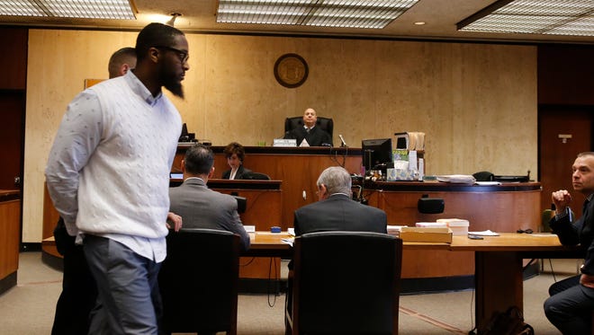 Basim Henry being led into court as the jury continues to deliberate Wednesday, March 29, 2017, Newark, N.J. Henry is one of four men charged in the death of Dustin Friedland.
