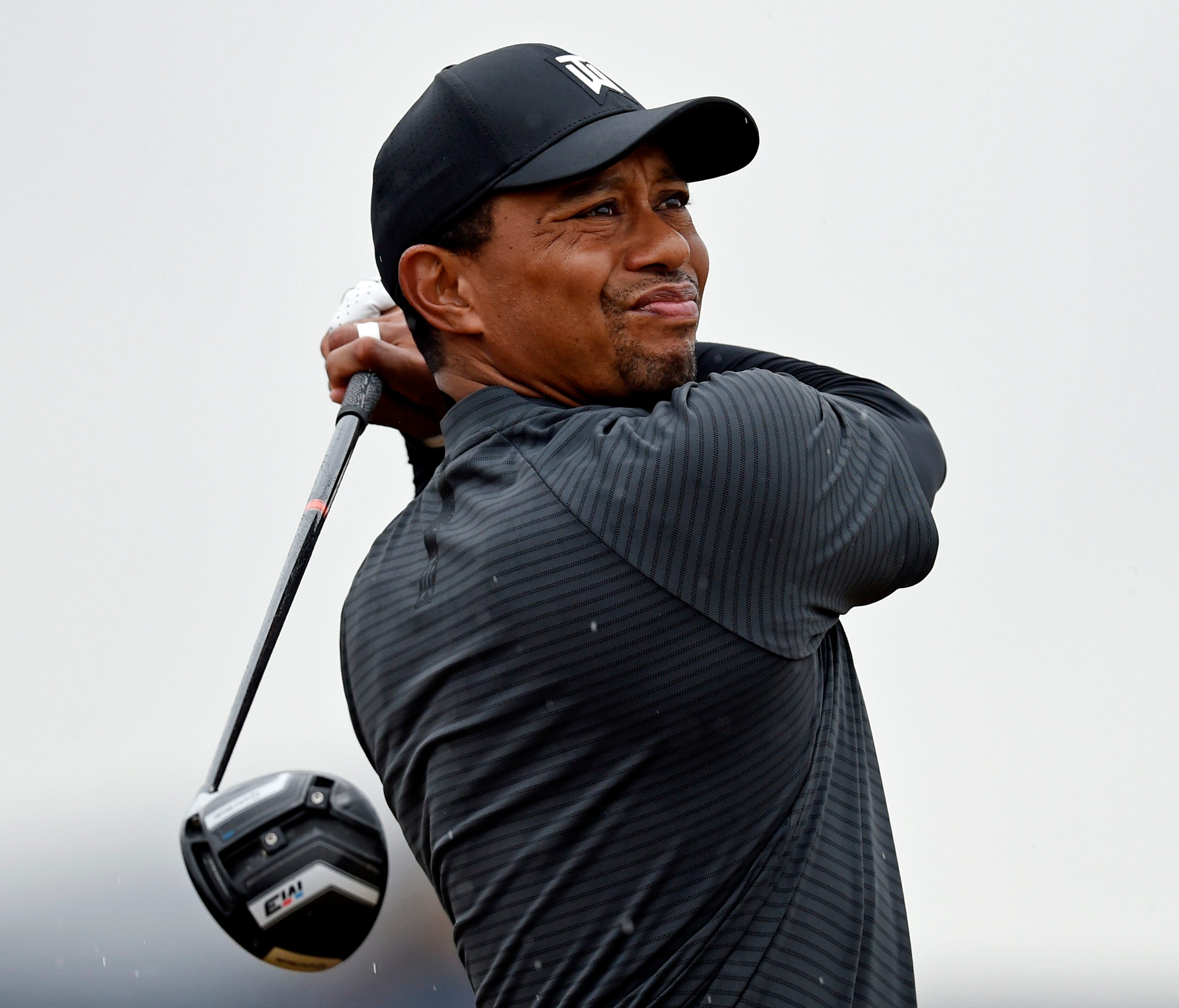 Tiger Woods plays his shot from the second tee during the second round of The Open Championship golf tournament at Carnoustie Golf Links.