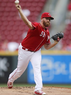 Cincinnati Reds starting pitcher Dan Straily (58) delivers a pitch in the top of the first inning of the MLB interleague game between the Cincinnati Reds and the Texas Rangers at Great American Ball Park in downtown Cincinnati on Tuesday, Aug. 23, 2016. After five innings, the game was scoreless.