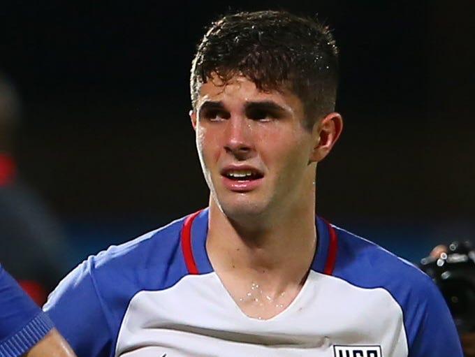Christian Pulisic reacts to his team's loss against Trinidad and Tobago.