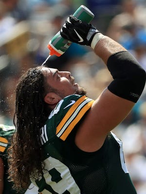 Getty Images
Packers left tackle David Bakhtiari?s four-year extension could reach $51.67 million.
JACKSONVILLE, FL - SEPTEMBER 11: David Bakhtiari #69 of the Green Bay Packers cools off during a game against the Jacksonville Jaguars at EverBank Field on September 11, 2016 in Jacksonville, Florida.  (Photo by Mike Ehrmann/Getty Images)