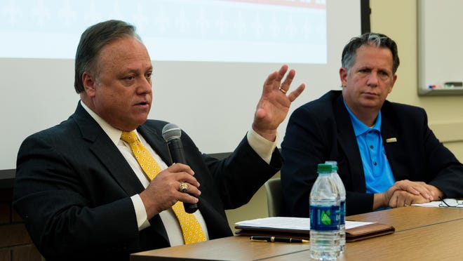 Dee Stanley, left, chief administrative officer of the Lafayette Consolidated Government, and Joel Robideaux, a state representative, participated in a forum Wednesday for city-parish president candidates.