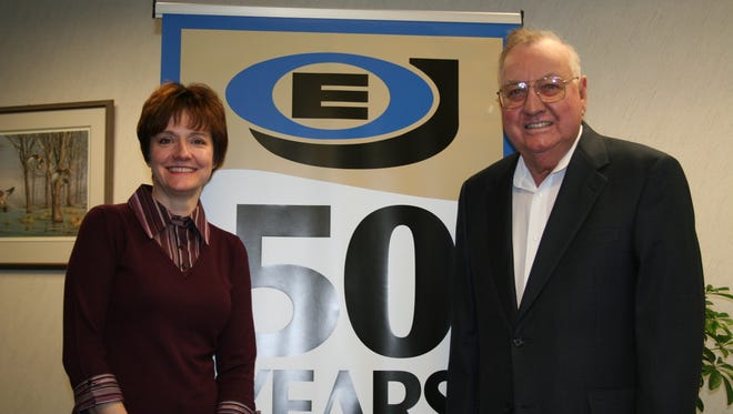 Mary Jo Johnson and her father, E.O., celebrate the 50th anniversary of EO Johnson Co. in 2007.