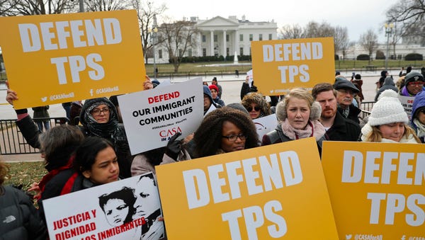 Immigration advocates rally near the White House...