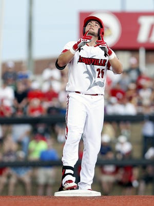 Louisville's Blake Tiberi hits an RBI-double against Ohio State on June 4. Tiberi, a Holy Cross graduate, was selected in the third round of the 2016 MLB Draft on June 10.