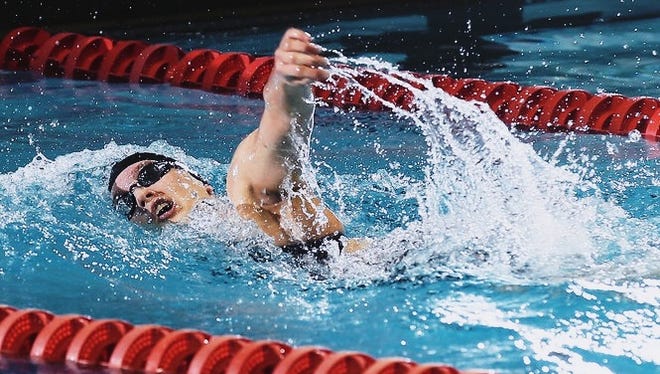 New Providence swimmer  Sophia Kudryashova competes in a race.