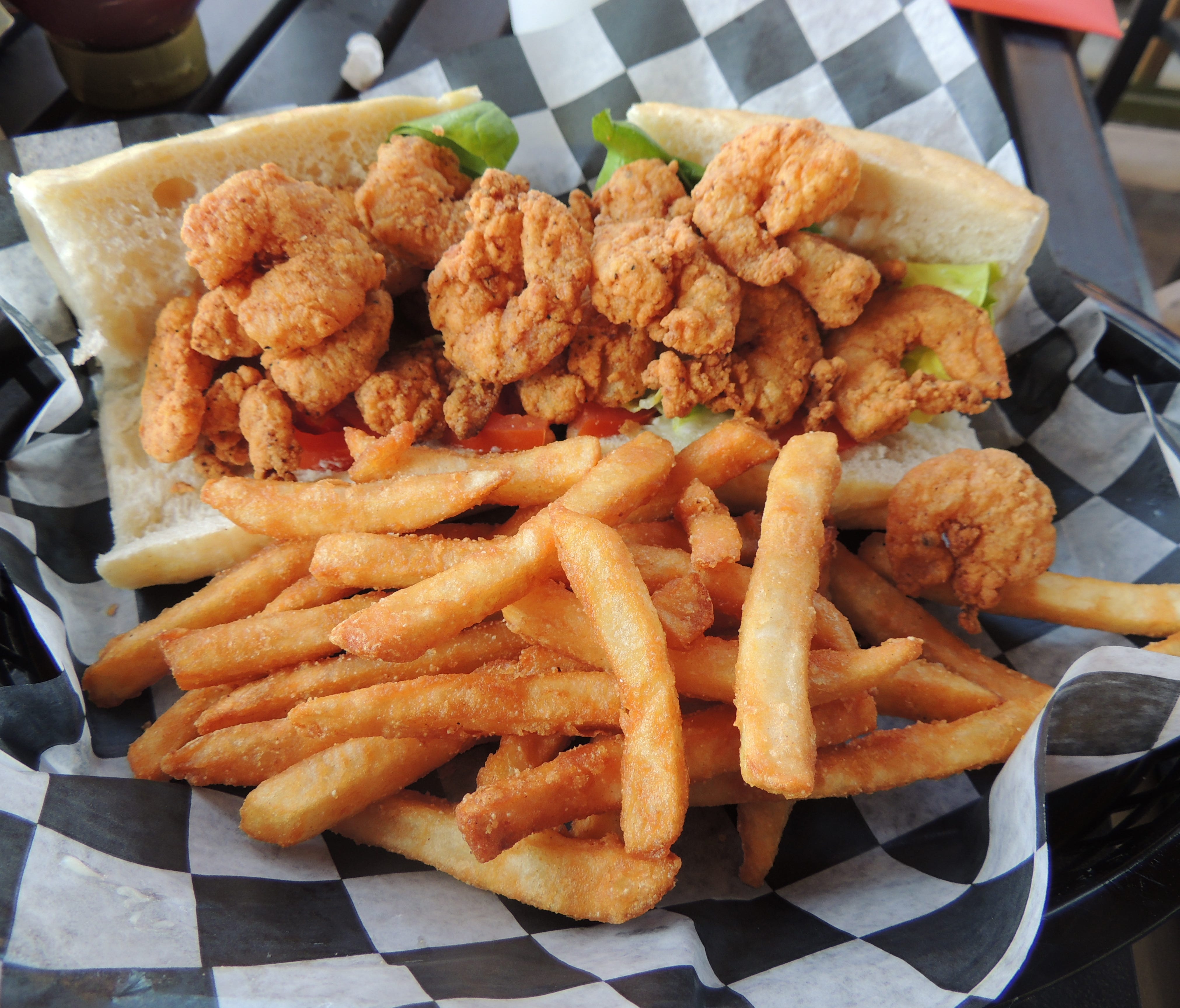 One of the perennial bestsellers at Rosetti's is the wild Gulf shrimp po' boy, served on bread baked in house with perfectly cooked fries.