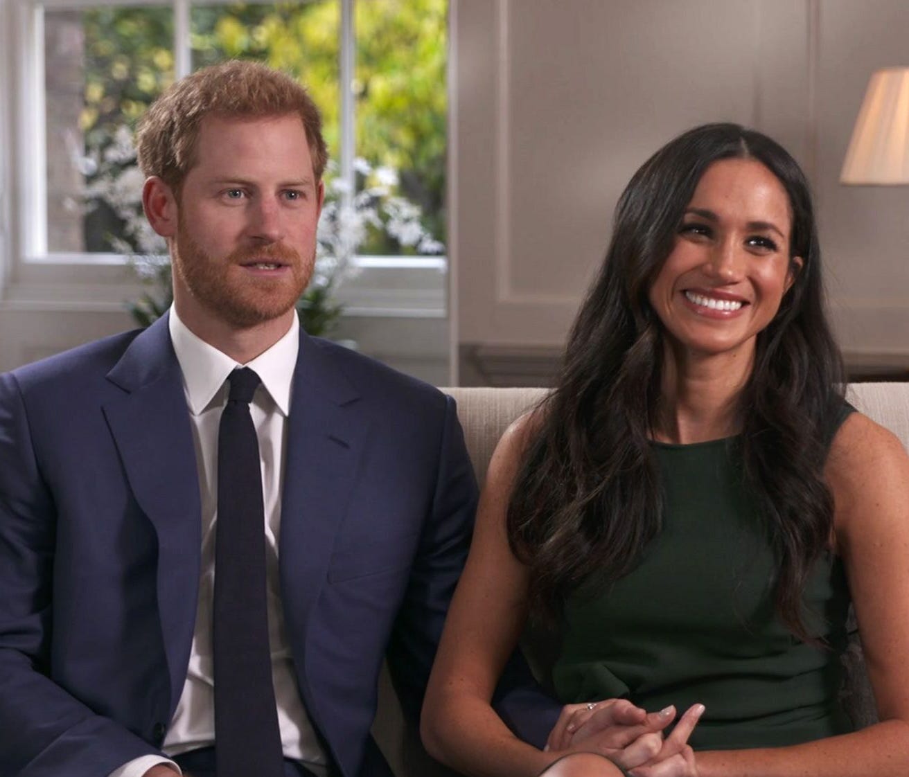 Prince Harry and Meghan Markle in their first TV interview as an engaged couple, Nov. 27, 2017, in London.