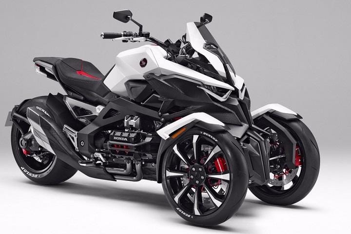 Motorcycle with 2 wheels in front and 1 in back top
