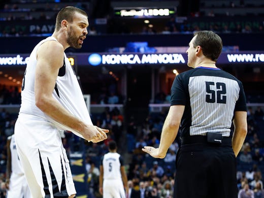 Memphis Grizzlies center Marc Gasol (right) argues