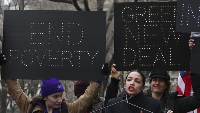 Rep. Alexandria Ocasio-Cortez, D-N.Y., speaks during the Women's March Alliance, Saturday, Jan. 19, 2019, in New York. One procession, a march through midtown Manhattan, is being organized by the Women's March Alliance, a nonprofit group whose leaders are putting on their demonstration for the third straight year. Another event, a downtown Manhattan rally held at roughly the same time Saturday, is being organized by the New York City chapter of Women's March Inc., the group formed to help organize the 2017 demonstration in Washington, D.C. (AP Photo/Mary Altaffer)
