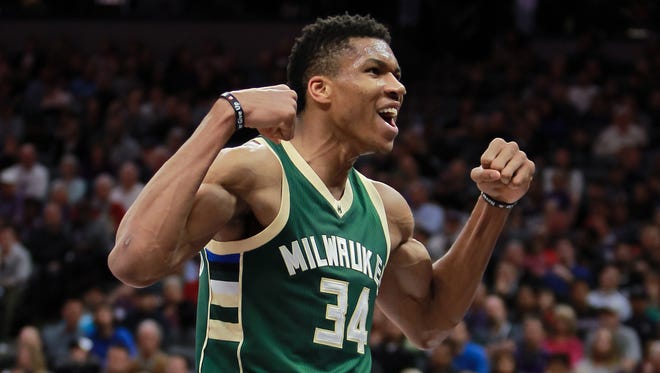 Giannis Antetokounmpo celebrates after a play against the Kings on Wednesday.