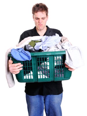 Man holding laundry