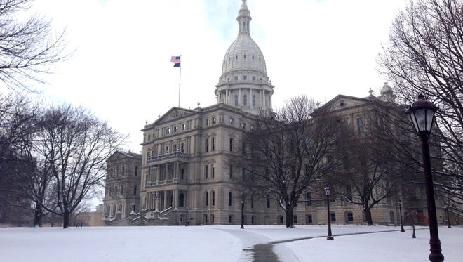 The exterior of the Michigan State Capitol in Lansing in winter.