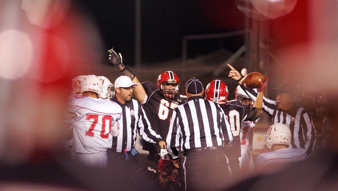 Coshocton falls to Dover 35-21.