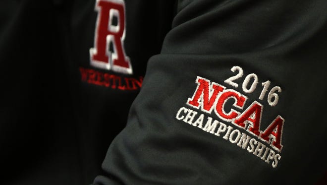 Rutgers wrestler Anthony Ashnault wears a NCAA championship logo on his sleave, Monday, March 14, 2016, at the College Avenue Gym in New Brunswick.