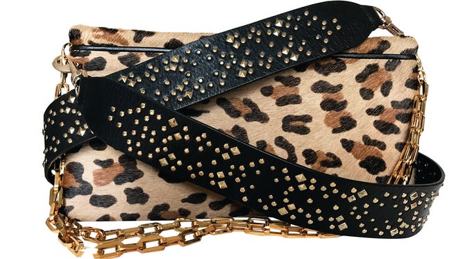  Jazz up an old purse with a hip guitar strap like this one by Rebecca Minkoff, $95, Scout.