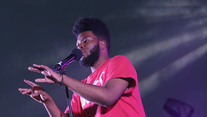 Khalid wooed El Pasoans with his smooth delivery during an invite-only concert in front of an intimate crowd of 300 at the Americas High School football field.