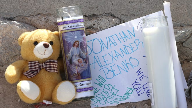Several candles, notes and stuffed animals were left at a memorial for Johnathan Alexander Benko, the Parkland Middle School student who was struck and killed by a vehicle Friday outside the school.