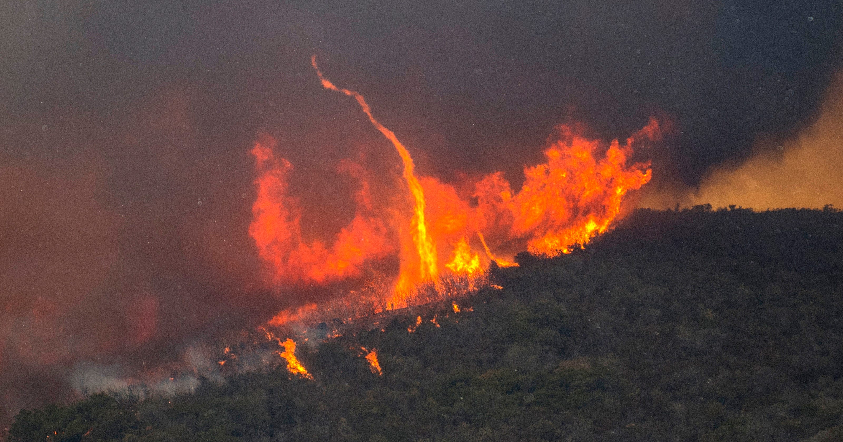 california fires: arson charges against suspect in holy fire