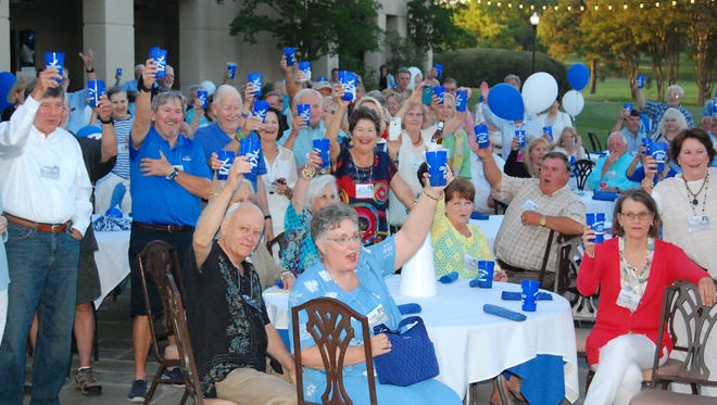 Sidney Lanier 1966 Classmates raise a glass to toast good friends and memories during the first night of their 50th-year reunion at the Montgomery Country Club (Contributed)