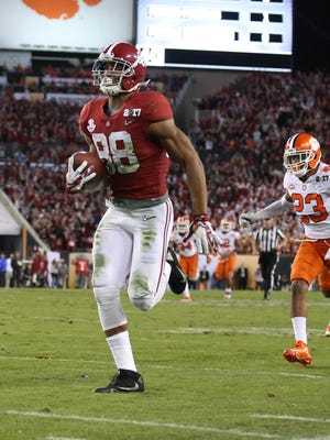 Alabama Crimson Tide tight end O.J. Howard (88) could be a Bengals target with the ninth overall selection in the draft.