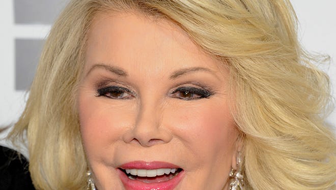 - In this April 30, 2012 file photo, Joan Rivers attends an E! Network event in New York