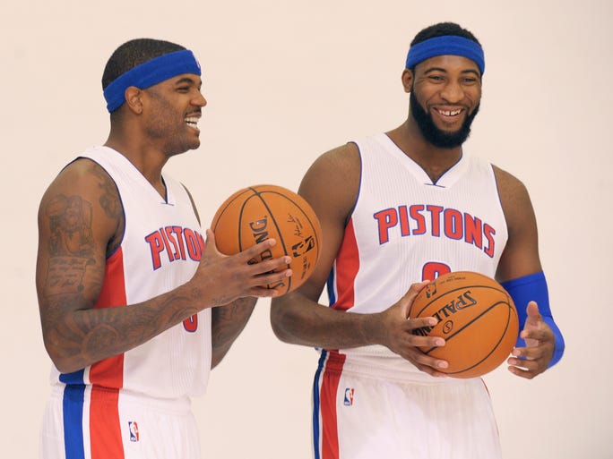 The Pistons' Josh Smith, left, and Andre Drummond joke around during a photo shoot.