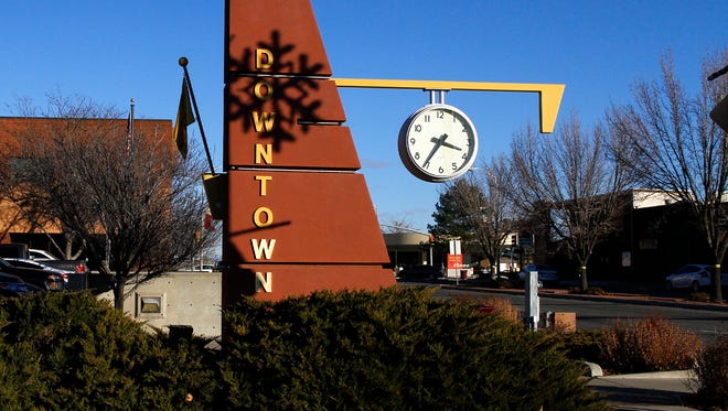 A sign for downtown Farmington is seen Oct. 19 along North Allen Avenue and East Broadway Avenue.