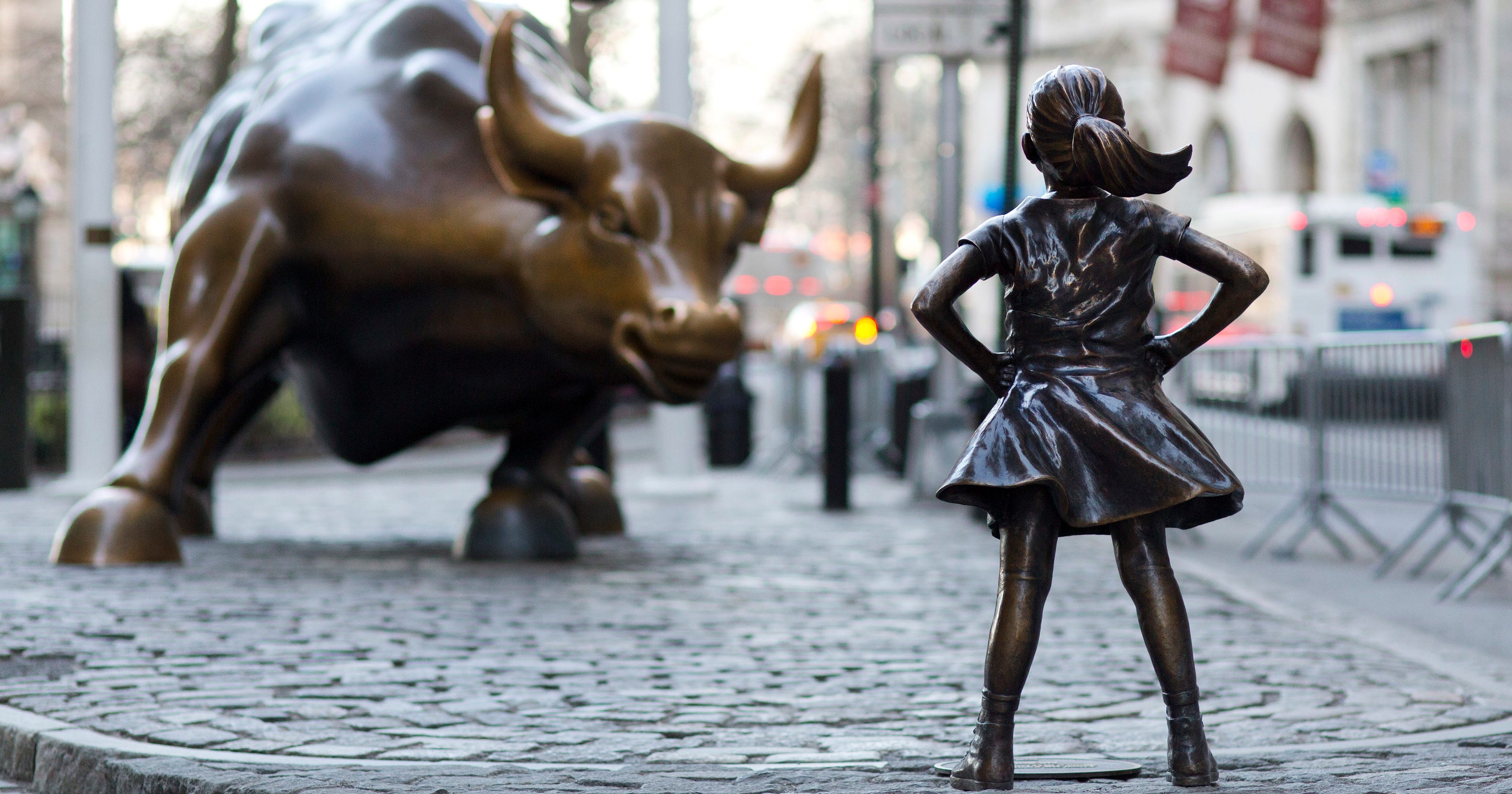 'Fearless Girl' statue will keep staring down Wall Street's bull