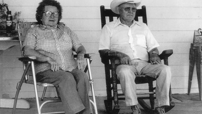 Stella and Jim Herron relax on the front porch at their beloved Rocking H Ranch in Kimble County.