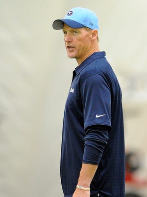 Titans head coach Ken Whisenhunt paces the field during practice at Saint Thomas Sports Park on Tuesday, June 2, 2015, in Nashville.