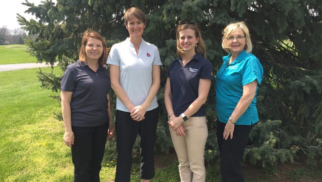 From left to right: Women's golf clinic organizers Cheryl Honkomp, Katherine Mowat, Erika Hayes and Nancy Norris pose for a portrait at The Players Club in Yorktown.