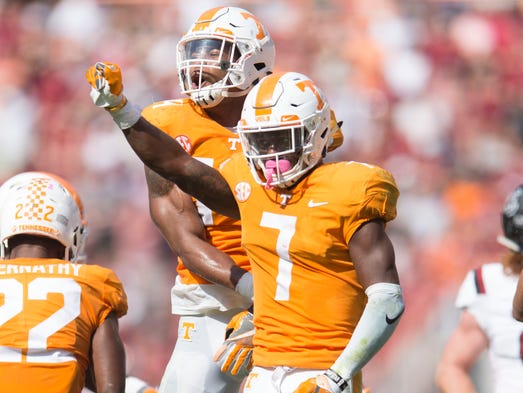 Tennessee player celebrate during a Tennessee vs. South