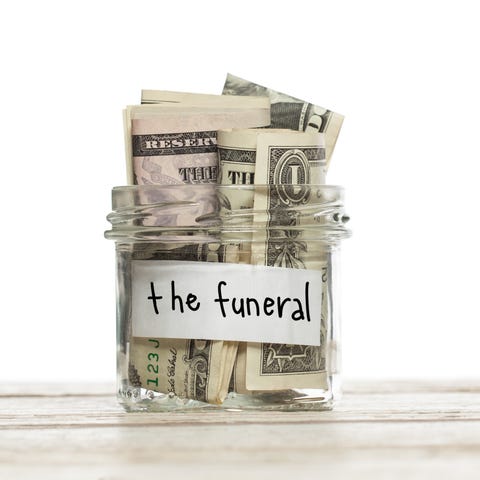 Jar that says the funeral filled with rolled-up do