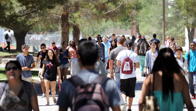 Students walk the International Mall this semester at New Mexico State University in Las Cruces.