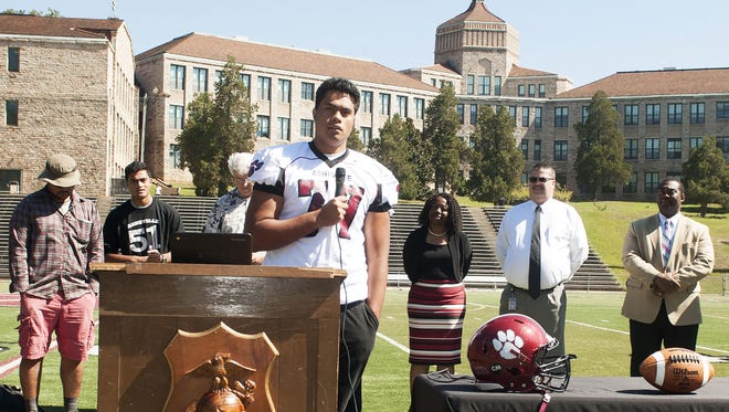 Asheville High senior Pete Leota committed to play college football for South Carolina on Sept. 17.