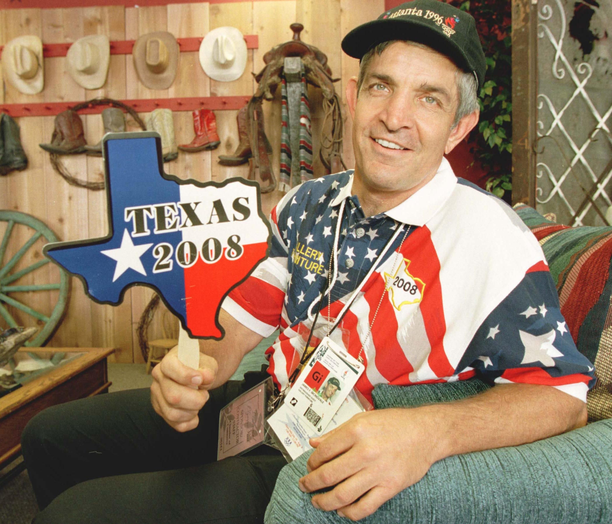 As far back as 1996, when this picture was taken during the Summer Olympic Games in Atlanta, owner Jim McIngvale of Gallery Furniture in Houston has been a booster, in this case pushing for Texas as an Olympic venue in 2008.