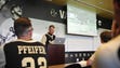Vanderbilt coach Tim Corbin talks to his team while