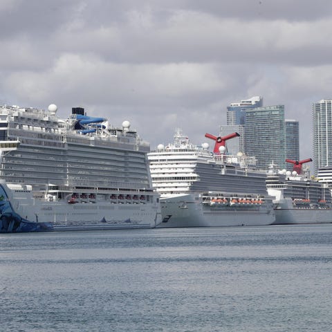 Cruise ships are docked at PortMiami, Tuesday, Mar