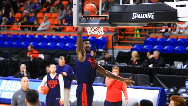 Mar 14, 2018: Arizona Wildcats forward Deandre Ayton (13) shoots during the practice day before the first round of the 2018 NCAA Tournament at Taco Bell Arena.