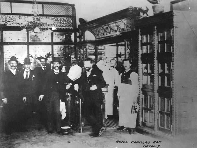 Gentlemen gather at the bar at the Hotel Cadillac,