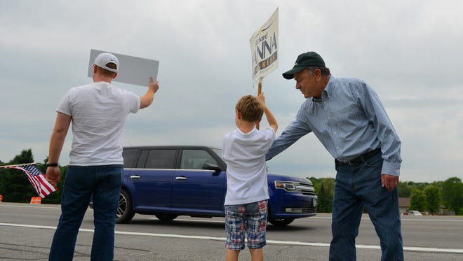 Rep. Richard Hanna, right, campaigns with his son Emerson, 7, during the 2014 election.
