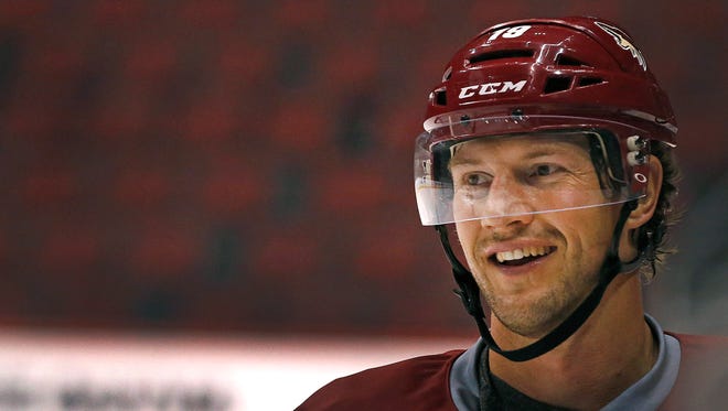 The Coyotes’ Shane Doan has a laugh during Veterans Camp at Gila River Arena in Glendale on Sept. 20, 2014.