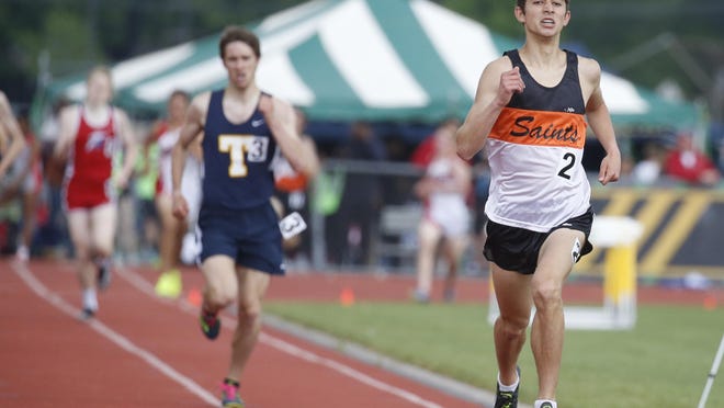 Churchville's Peter Kostarellis wins the Class AA 1600 meters during the Section V Track and Field Championships at Rush-Henrietta High School.
