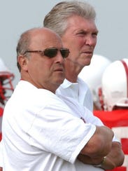 Current Wisconsin athletic director Barry Alvarez (left)