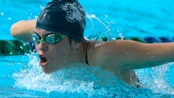 
Estero High School Bean Faunce swims in the girls 100 Yard Butterfly at the FHSAA 2A Region 4 Championship, Friday (11/7/14) at The FGCU Swimming Complex.
