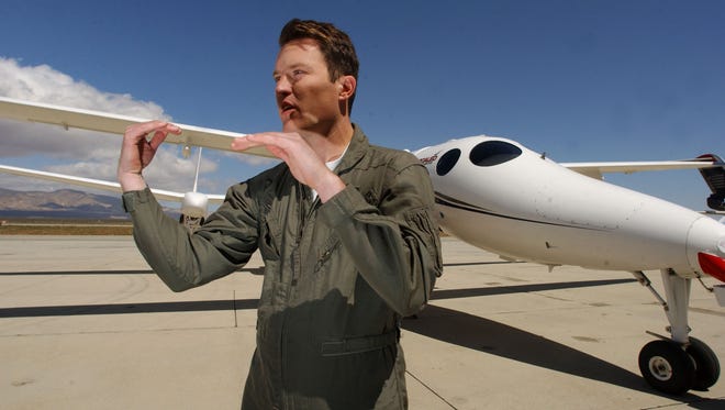 Pilot Mike Alsbury was killed in the Virgin SpaceShipTwo crash in Mojave Desert.  Mike Alsbury, a project engineer and pilot, gestures as he explains a potential midair collision scenario April 3, 2003 in Mojave, Calif.